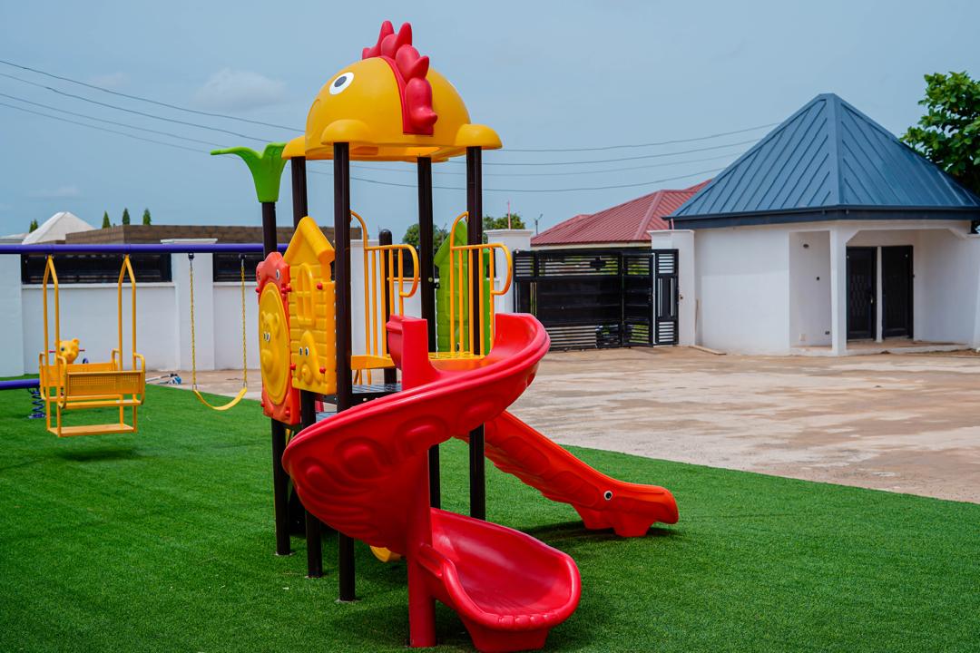 Play equipment gives children room to climb, slide, and move.